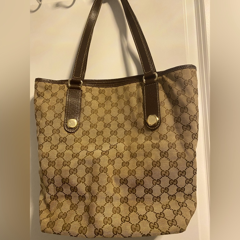 Brown&Beige Supreme Strapless Gucci Canvas HandleBag
Brown Leather Trim